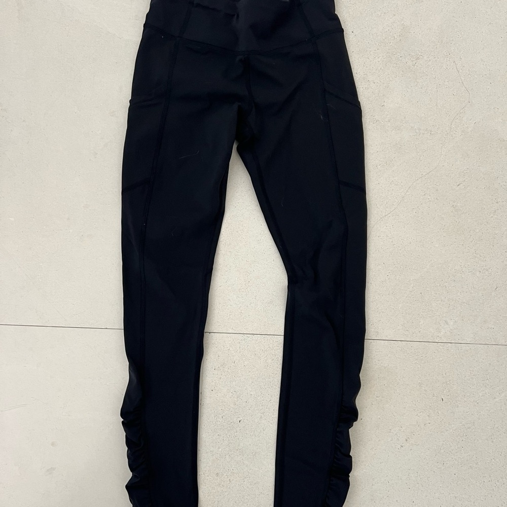 Lululemon black leggings. Size 4.